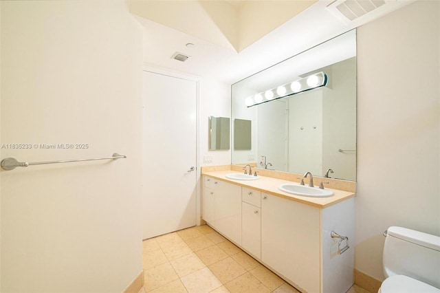 20000 E Country Club Dr Unit Ts02, Aventura, FL 33180 - bathroom featuring double vanity and tile patterned flooring