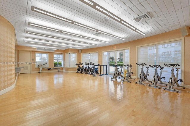 20000 E Country Club Dr Unit Ts02, Aventura, FL 33180 - gym with wood finished floors, wallpapered walls, and french doors