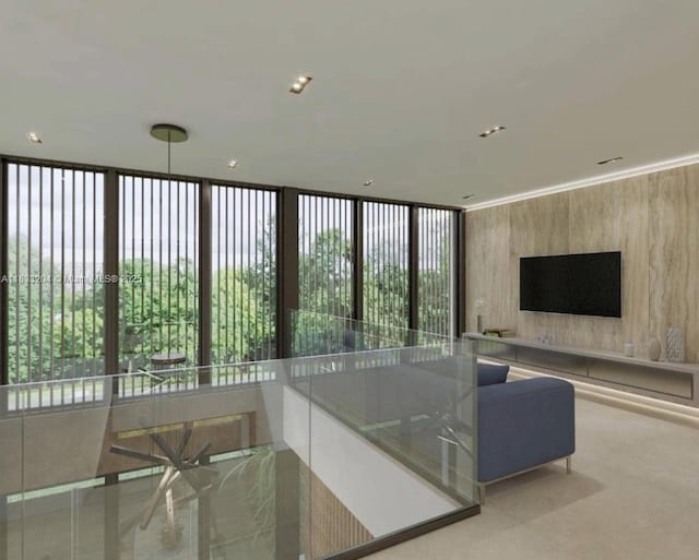 4050 Loquat Ave, Coconut Grove, FL 33133 - living room featuring healthy amount of natural light and wood walls