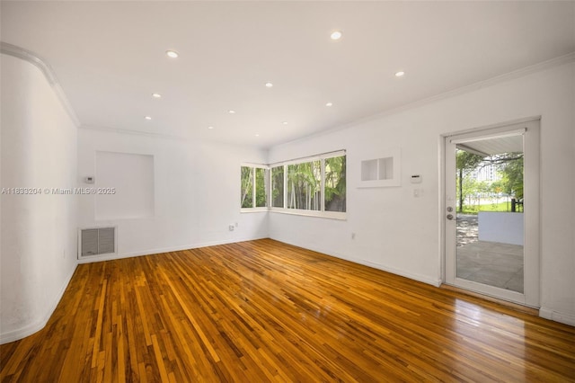4050 Loquat Ave, Coconut Grove, FL 33133 - unfurnished room featuring crown molding, hardwood / wood-style flooring, healthy amount of natural light, and recessed lighting