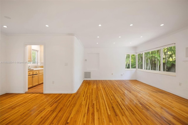 4050 Loquat Ave, Coconut Grove, FL 33133 - spare room with light wood-style floors, ornamental molding, and recessed lighting