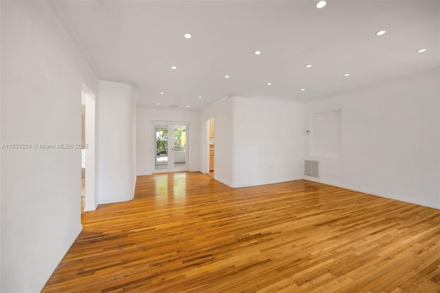 4050 Loquat Ave, Coconut Grove, FL 33133 - empty room featuring light wood finished floors, recessed lighting, and crown molding