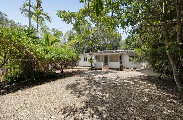 4050 Loquat Ave, Coconut Grove, FL 33133 - back of property with stucco siding