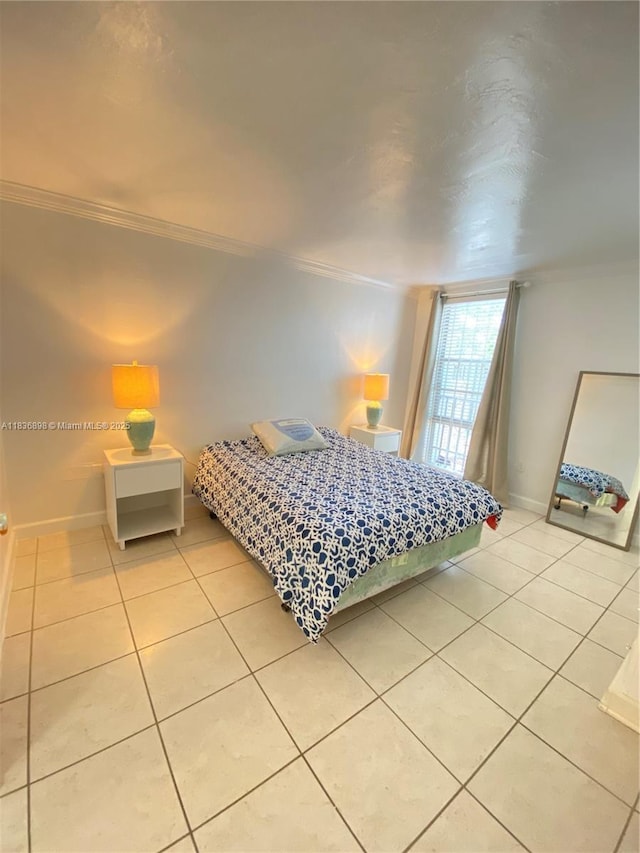 6900 N Kendall Dr Unit A102, Pinecrest, FL 33156 - bedroom featuring ornamental molding and light tile patterned flooring