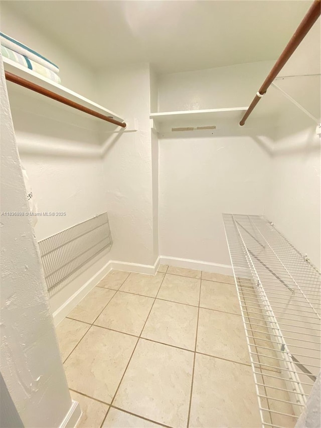 6900 N Kendall Dr Unit A102, Pinecrest, FL 33156 - spacious closet featuring light tile patterned flooring