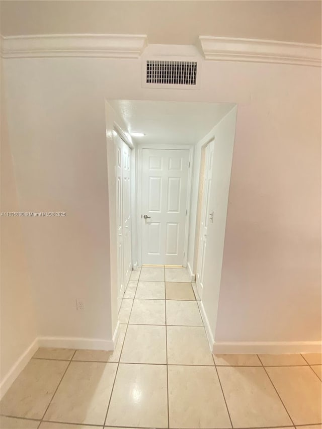 6900 N Kendall Dr Unit A102, Pinecrest, FL 33156 - hallway featuring light tile patterned floors and ornamental molding