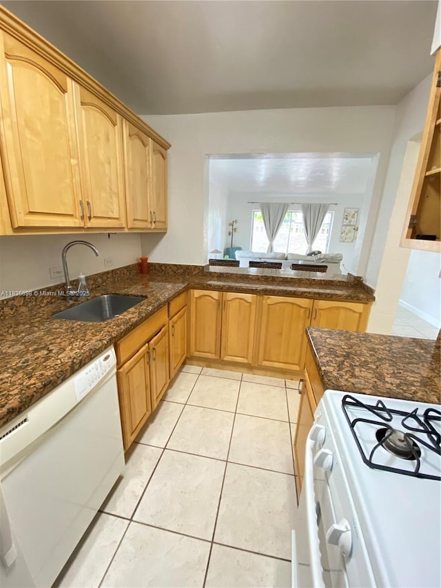 6900 N Kendall Dr Unit A102, Pinecrest, FL 33156 - kitchen featuring white appliances, light tile patterned floors, and dark stone counters