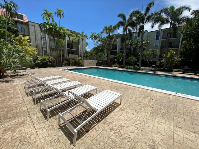 6900 N Kendall Dr Unit A102, Pinecrest, FL 33156 - community pool featuring a patio