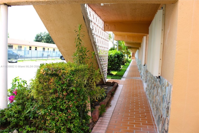 1154 W 35th St Unit 221, Hialeah, FL 33012 - view of property exterior with stucco siding