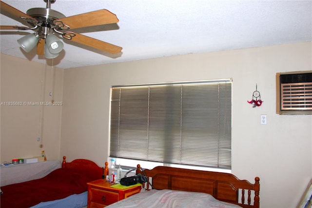 1154 W 35th St Unit 221, Hialeah, FL 33012 - bedroom featuring a wall unit AC and ceiling fan