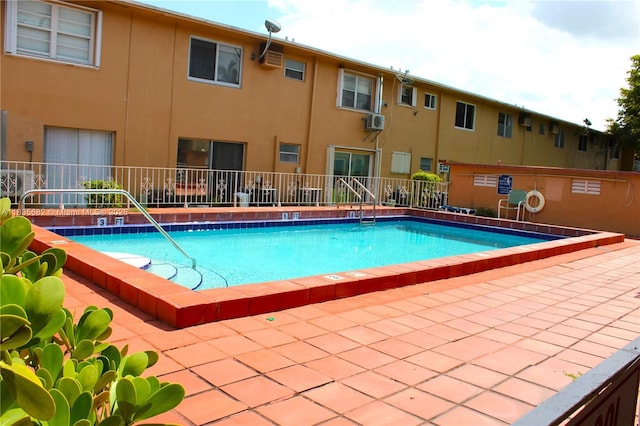 1154 W 35th St Unit 221, Hialeah, FL 33012 - community pool featuring cooling unit and a patio area