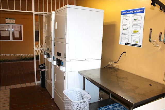1154 W 35th St Unit 221, Hialeah, FL 33012 - utilities with stacked washer / dryer