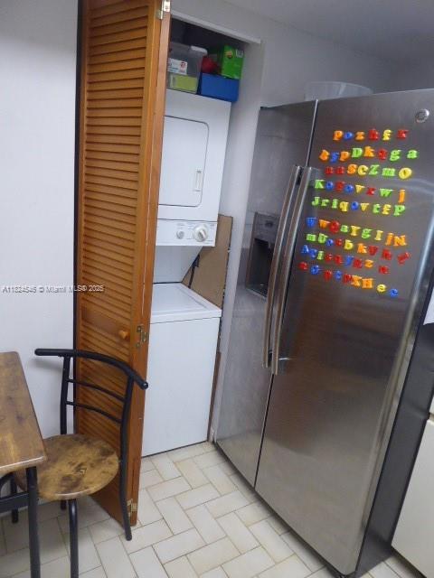 15299 SW 45th Ter Unit G-63, Miami, FL 33185 - washroom featuring stacked washing machine and dryer