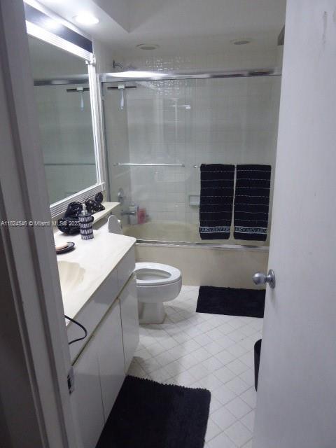 15299 SW 45th Ter Unit G-63, Miami, FL 33185 - bathroom with vanity, enclosed tub / shower combo, and tile patterned floors