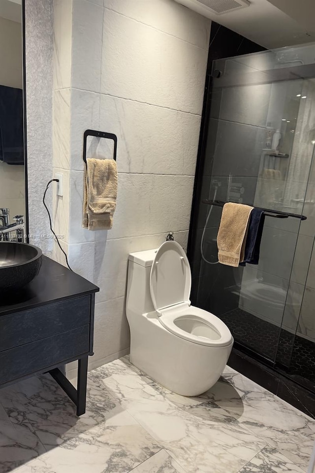 20379 W Country Club Dr Unit 2333, Aventura, FL 33180 - bathroom featuring marble look tiles, a shower stall, and vanity