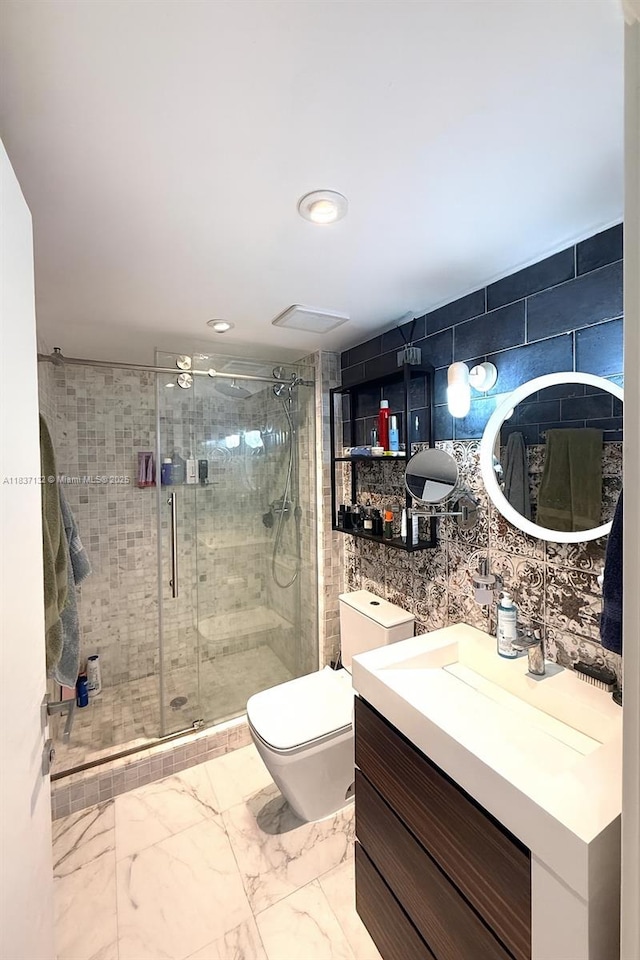 20379 W Country Club Dr Unit 2333, Aventura, FL 33180 - bathroom featuring marble look tiles, vanity, a stall shower, tile walls, and recessed lighting