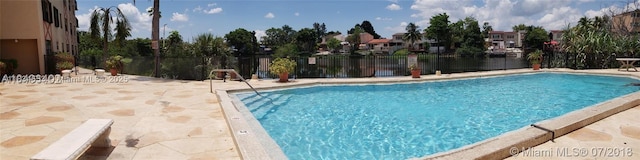 1325 W 68th St Unit 214, Hialeah, FL 33014 - community pool featuring a patio and a water view