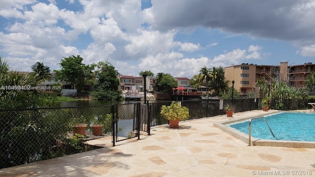 1325 W 68th St Unit 214, Hialeah, FL 33014 - community pool featuring a patio