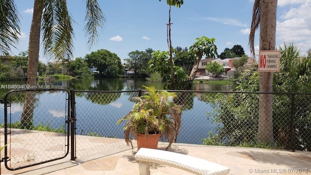1325 W 68th St Unit 214, Hialeah, FL 33014 - water view with a gate