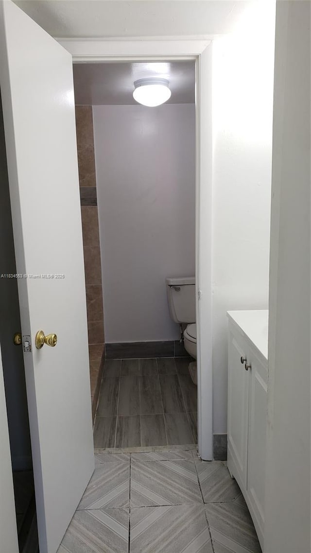 1325 W 68th St Unit 214, Hialeah, FL 33014 - bathroom with vanity and toilet