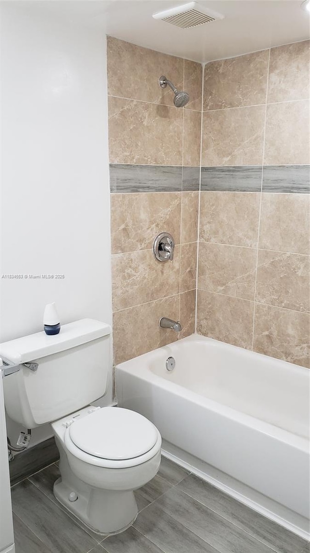 1325 W 68th St Unit 214, Hialeah, FL 33014 - full bath featuring toilet and bathing tub / shower combination
