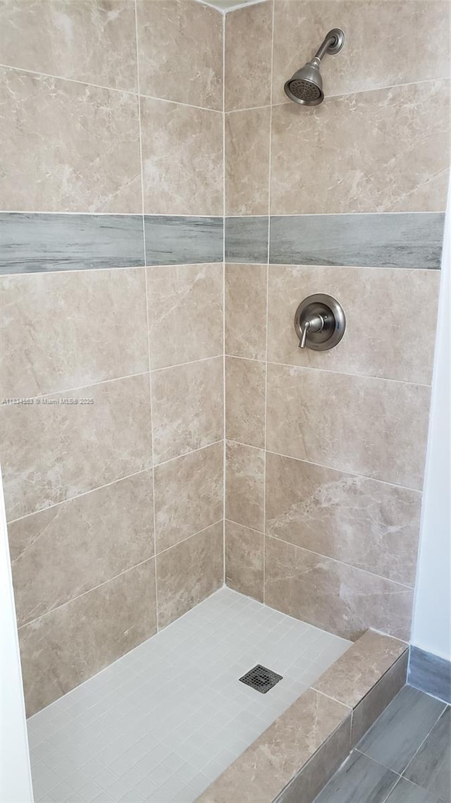 1325 W 68th St Unit 214, Hialeah, FL 33014 - full bath featuring a tile shower