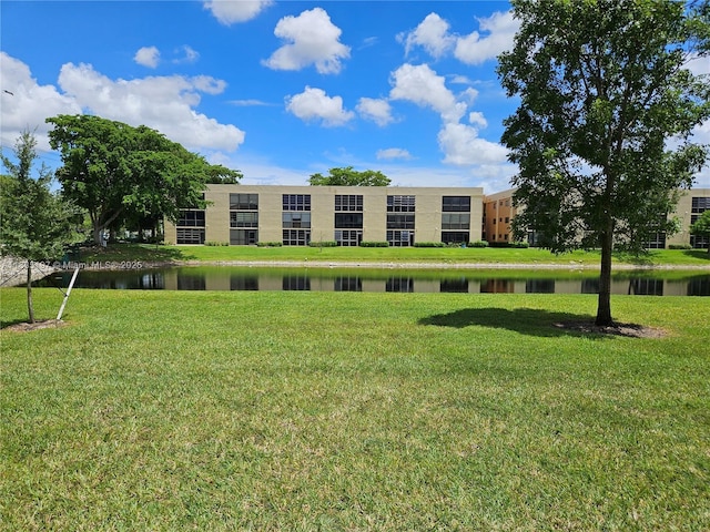 7611 Southampton Ter Unit 102, Tamarac, FL 33321 - view of apartment building / complex featuring a water view