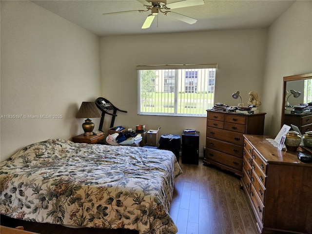 7611 Southampton Ter Unit 102, Tamarac, FL 33321 - bedroom featuring dark wood-style flooring and ceiling fan