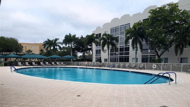 7611 Southampton Ter Unit 102, Tamarac, FL 33321 - community pool featuring a patio