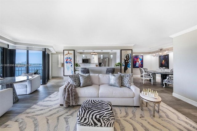 4000 Towerside Ter Unit 1507, Miami, FL 33138 - living area featuring a chandelier, crown molding, and wood finished floors