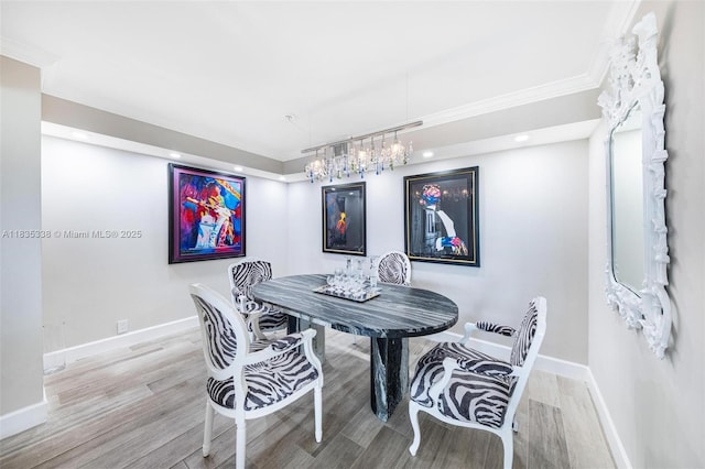 4000 Towerside Ter Unit 1507, Miami, FL 33138 - dining space with wood finished floors, recessed lighting, a chandelier, and crown molding