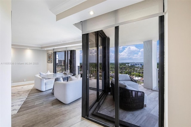 4000 Towerside Ter Unit 1507, Miami, FL 33138 - living room featuring wood finished floors, recessed lighting, and ornamental molding