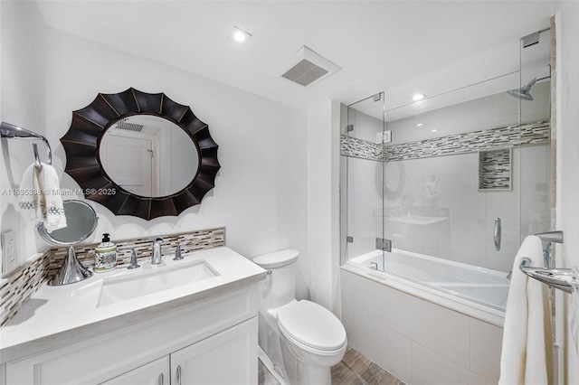 4000 Towerside Ter Unit 1507, Miami, FL 33138 - full bath with tiled shower / bath combo, vanity, wood finished floors, and tasteful backsplash