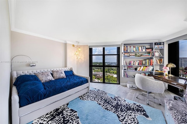 4000 Towerside Ter Unit 1507, Miami, FL 33138 - bedroom with ornamental molding and wood finished floors