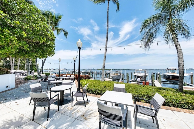 4000 Towerside Ter Unit 1507, Miami, FL 33138 - view of patio / terrace with a water view and a dock