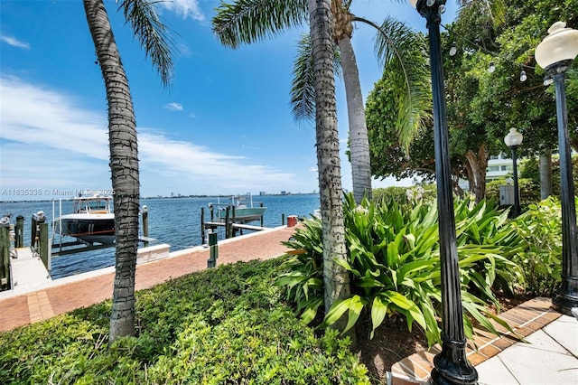 4000 Towerside Ter Unit 1507, Miami, FL 33138 - dock area featuring boat lift and a water view
