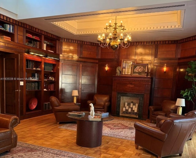 4000 Towerside Ter Unit 1507, Miami, FL 33138 - sitting room with a chandelier, a premium fireplace, and wood walls