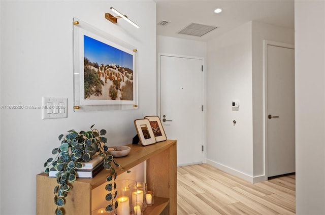 851 NE 1st Ave Unit 2809, Miami, FL 33132 - hall with light wood-style flooring and recessed lighting