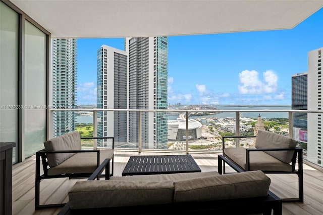 851 NE 1st Ave Unit 2809, Miami, FL 33132 - balcony with a water view, a view of city, and an outdoor hangout area