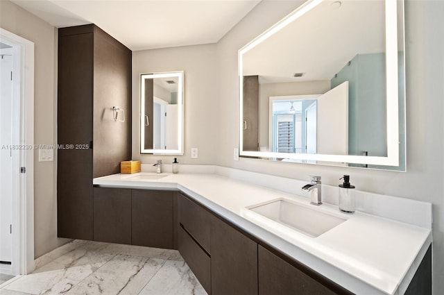851 NE 1st Ave Unit 2809, Miami, FL 33132 - full bathroom featuring marble finish flooring and double vanity