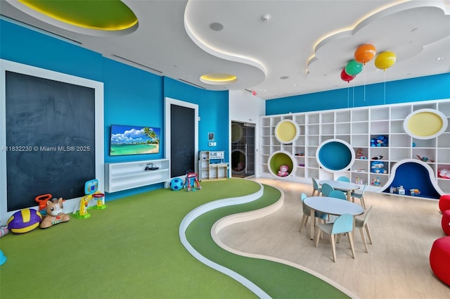 851 NE 1st Ave Unit 2809, Miami, FL 33132 - playroom featuring carpet