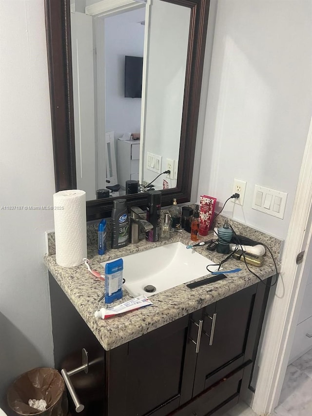4301 SW 160th Ave Unit 215, Miramar, FL 33027 - bathroom featuring washer and dryer and vanity