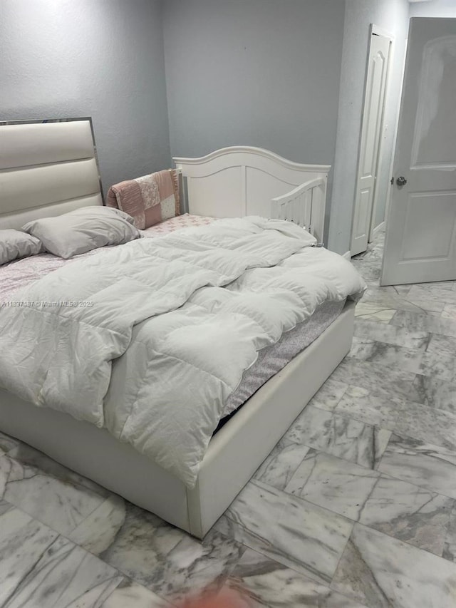 4301 SW 160th Ave Unit 215, Miramar, FL 33027 - bedroom featuring light marble finish flooring