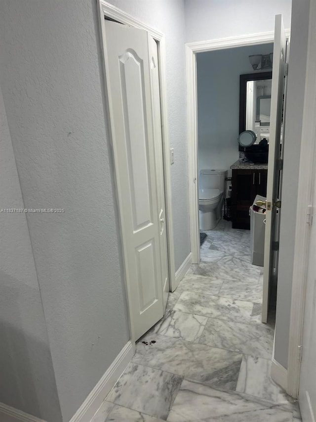 4301 SW 160th Ave Unit 215, Miramar, FL 33027 - hall with light marble finish floors and baseboards