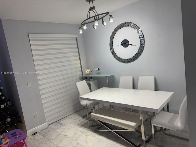 4301 SW 160th Ave Unit 215, Miramar, FL 33027 - dining space with light marble finish flooring and baseboards