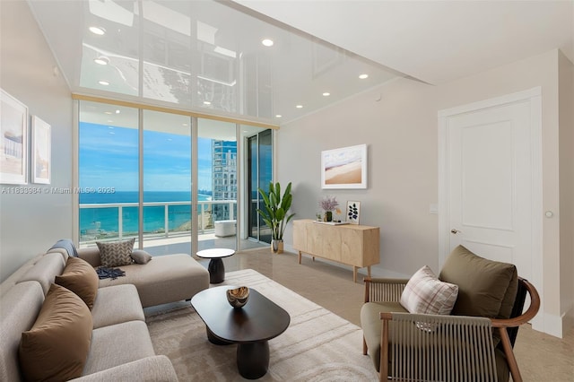 18101 Collins Ave Unit Ph5104, Sunny Isles Beach, FL 33160 - carpeted living area with a wall of windows, a water view, and recessed lighting