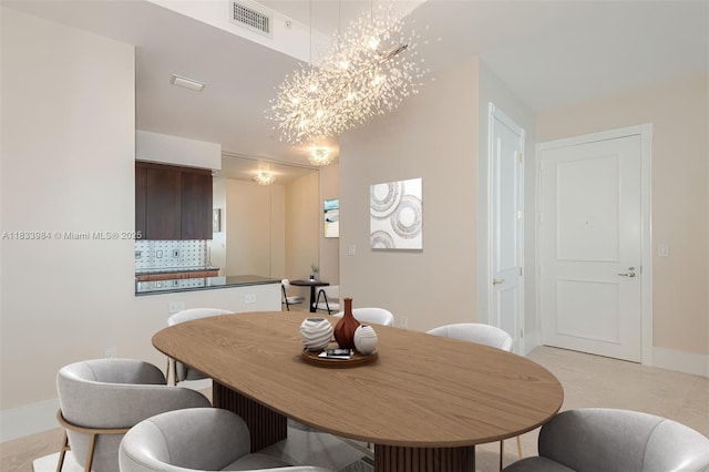 18101 Collins Ave Unit Ph5104, Sunny Isles Beach, FL 33160 - dining area featuring a chandelier and light tile patterned flooring