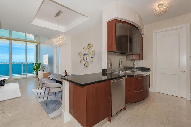 18101 Collins Ave Unit Ph5104, Sunny Isles Beach, FL 33160 - kitchen with stainless steel dishwasher, expansive windows, modern cabinets, pendant lighting, and a chandelier