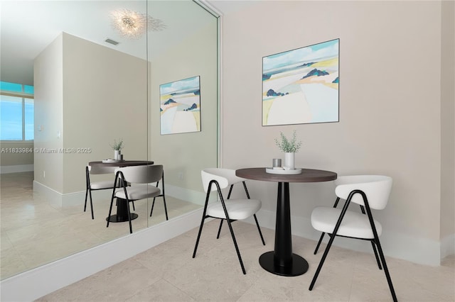 18101 Collins Ave Unit Ph5104, Sunny Isles Beach, FL 33160 - dining area featuring baseboards