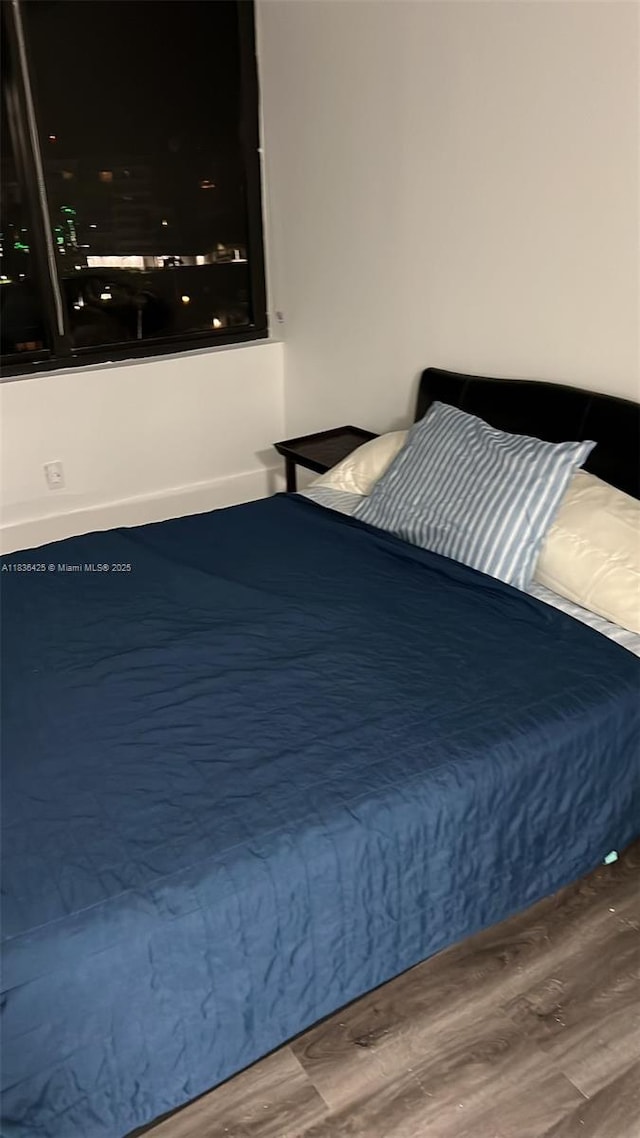 3589 S Ocean Blvd Unit 914, South Palm Beach, FL 33480 - bedroom with wood finished floors